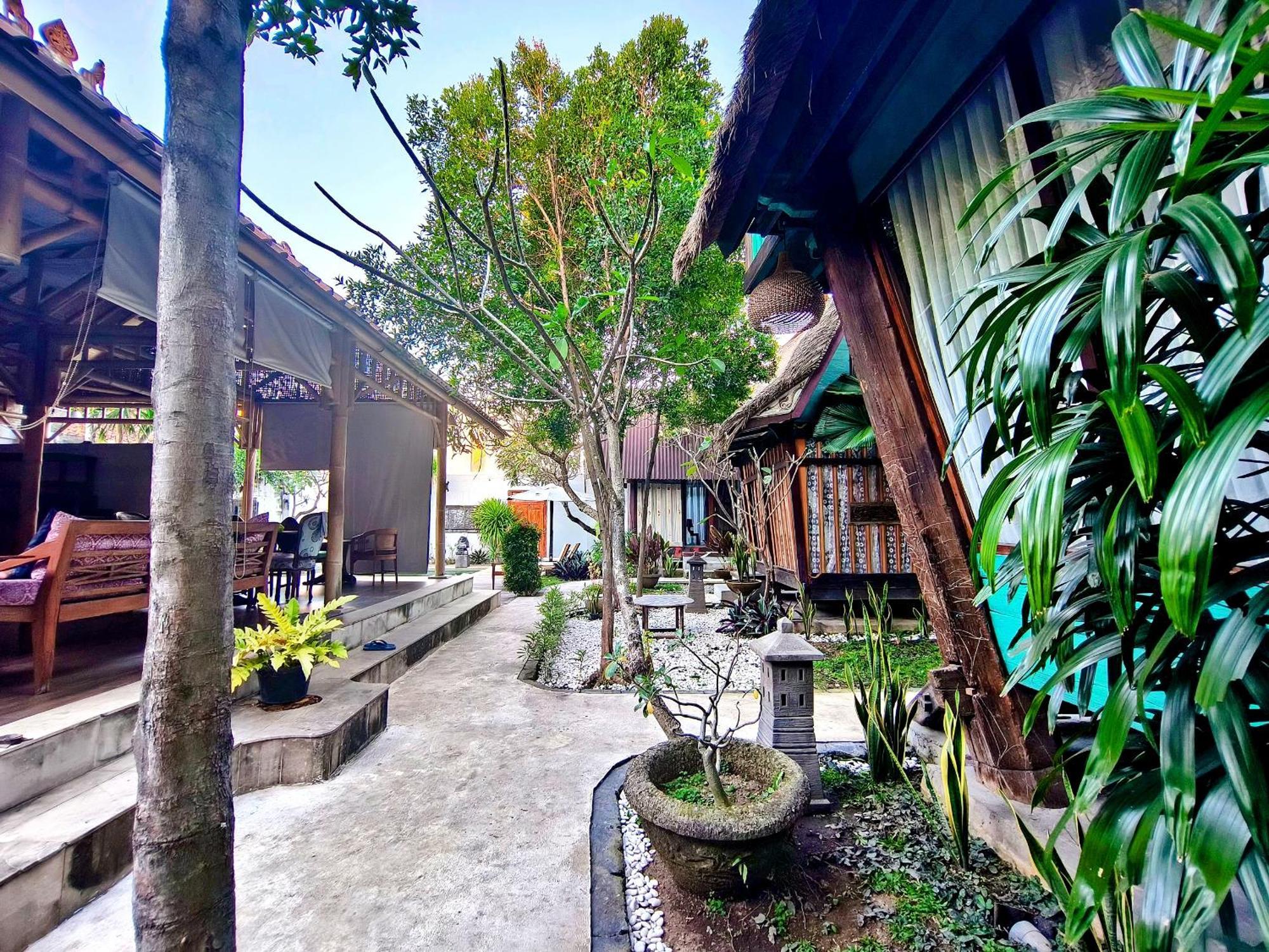 Bed and Breakfast Panda Lumbung Санур Экстерьер фото