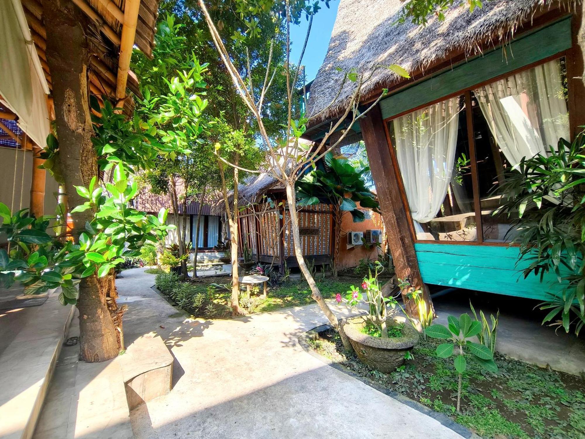Bed and Breakfast Panda Lumbung Санур Экстерьер фото