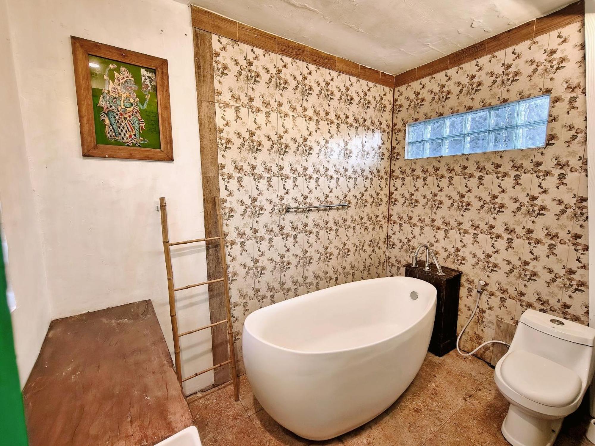 Bed and Breakfast Panda Lumbung Санур Экстерьер фото